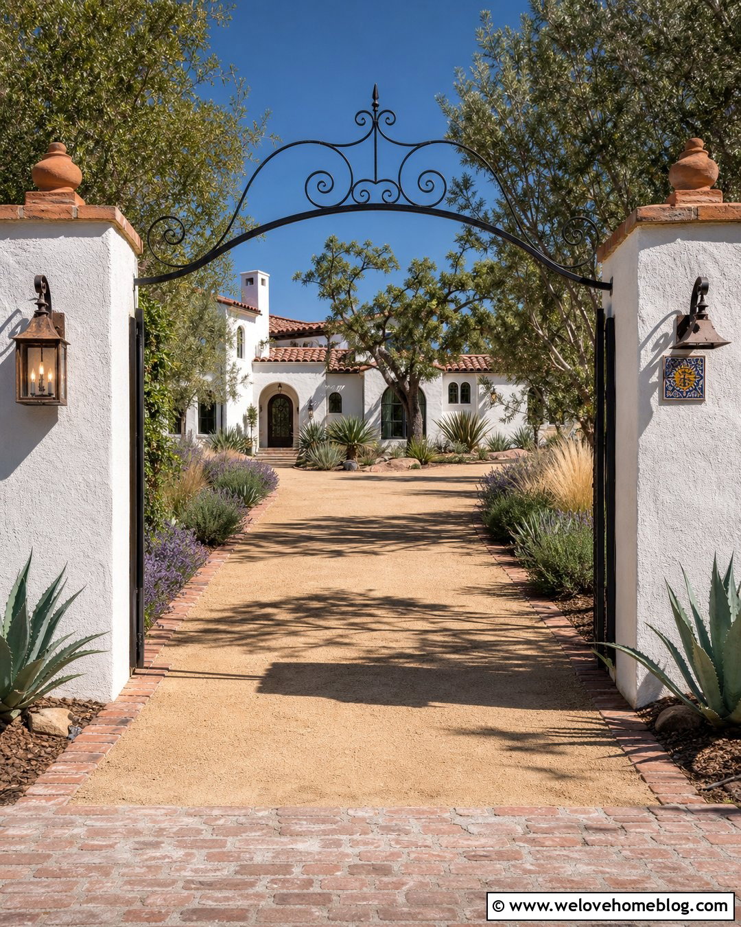 Stucco Hacienda Driveway Entrance With Wrought Iron Gate - 20 Hacienda Driveway Entrance Ideas