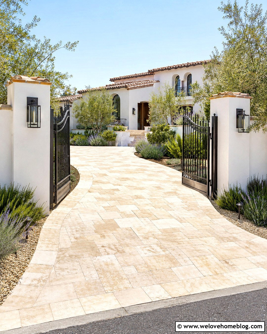 Travertine Paver Driveway Entrance With Stucco Pillars - 20 Paved Driveway Entrance Ideas
