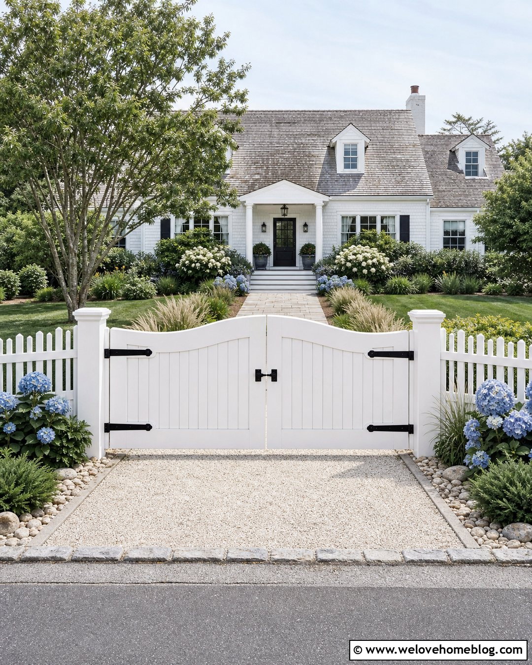 White Driveway Gate With Coastal Landscaping - 25 Driveway Gate Design Ideas