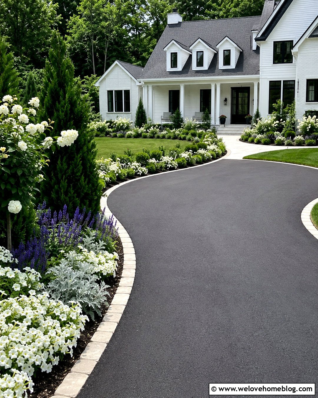White Flower Garden Beside Black Asphalt Driveway - 20 Garden Beside Driveway Ideas