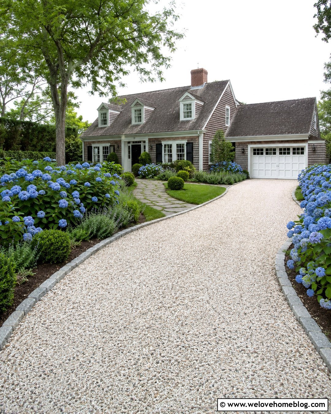 White Pebble Driveway With Hydrangea Borders - 20 White Pebble Driveway Ideas