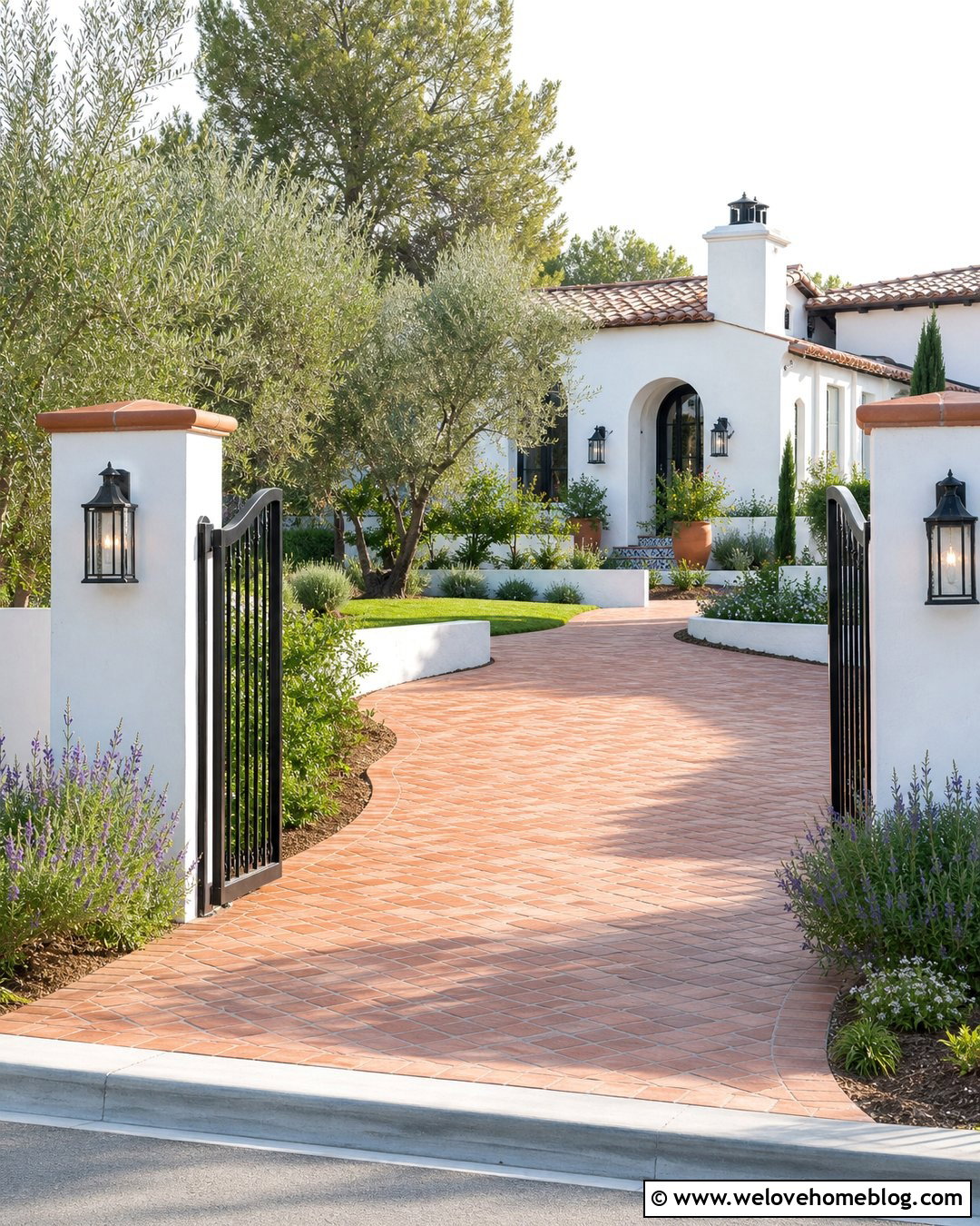 White Stucco Driveway Gate Pillars With Arched Iron Gate - 20 Driveway Gate Pillars Ideas